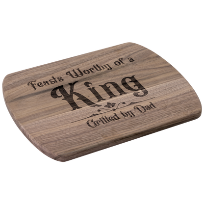 Cutting_Board_Feasts_Worthy_of_a_King_G_Dark_Rounded_H_Angle_Mockup.png